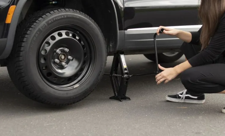 how does a jack make changing a tire easier