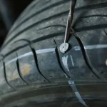 How Does a Nail Get into a Tire? Understanding the Causes and Solutions