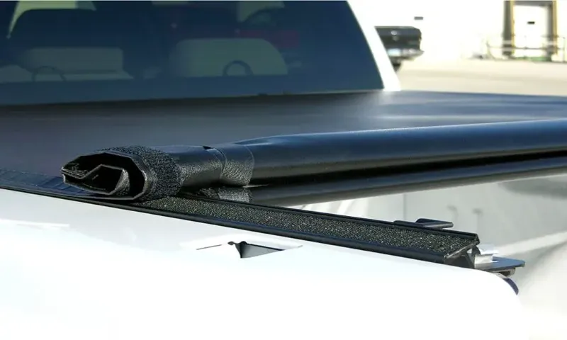 how does a tonneau cover attach