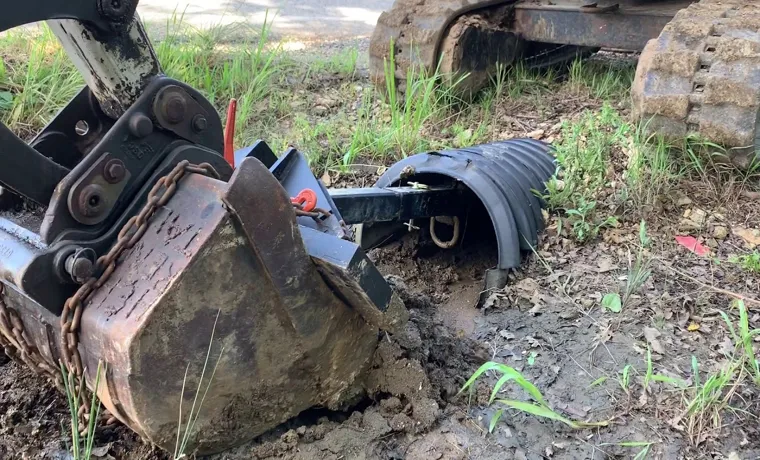 how to clean out a culvert with a tire