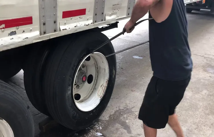 how to get a stuck tire off a truck