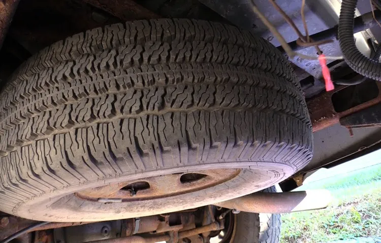 how to get spare tire from under truck