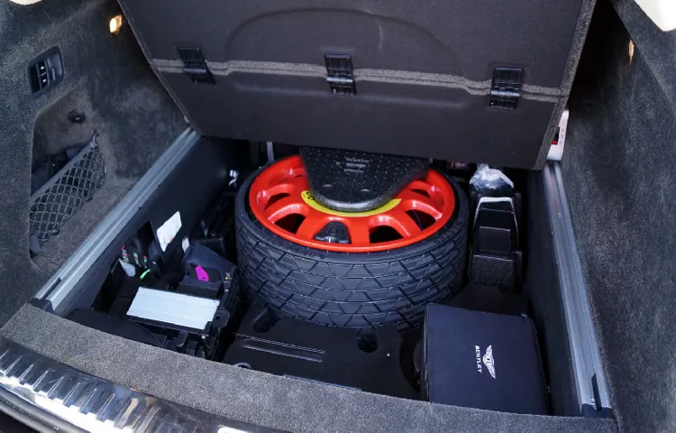 how to get spare tire out from under truck