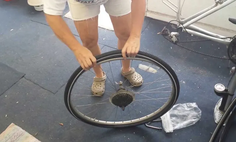 how to put a back tire on a bike