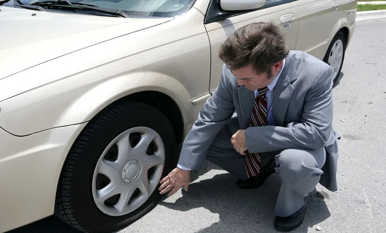 if you discover a flat tire while driving, what should you do