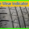 What is the wear bar on a tire and how to check its condition?