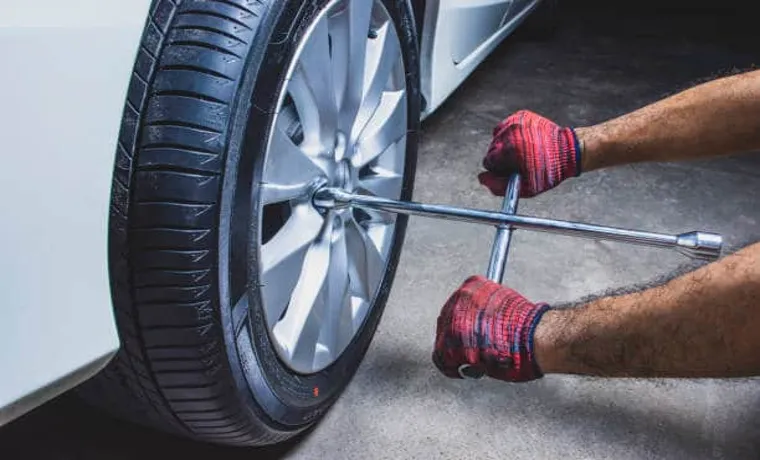 when changing a tire, turning the nuts ____ will loosen them.