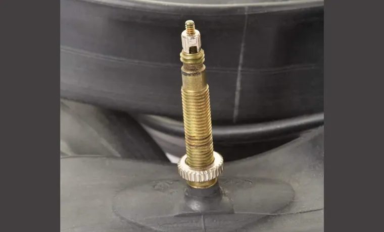 Why Does Opening the Air Valve of a Tire at a Constant Temperature Affect Its Pressure?