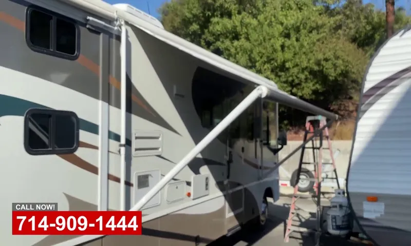 how to lower awning on rv