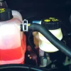 Should Coolant Reservoir Be Full When Hot: Common Questions Answered