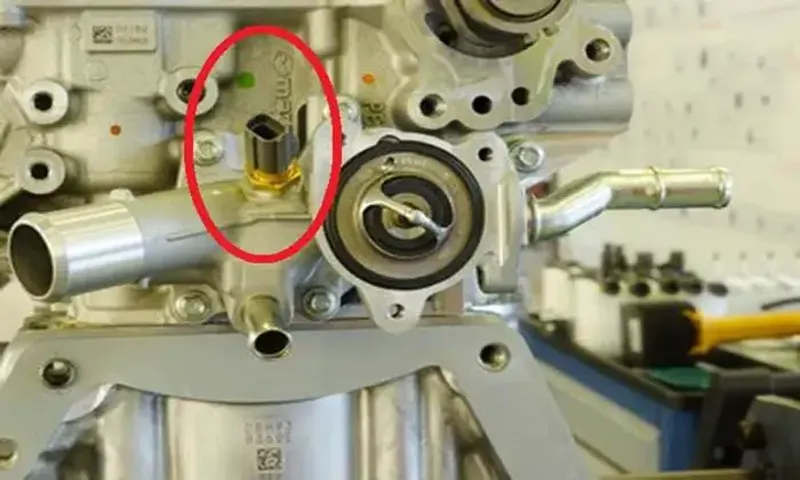 where is the coolant temperature sensor located