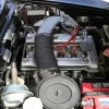 Why is my car overheating with coolant? Common causes and solutions.